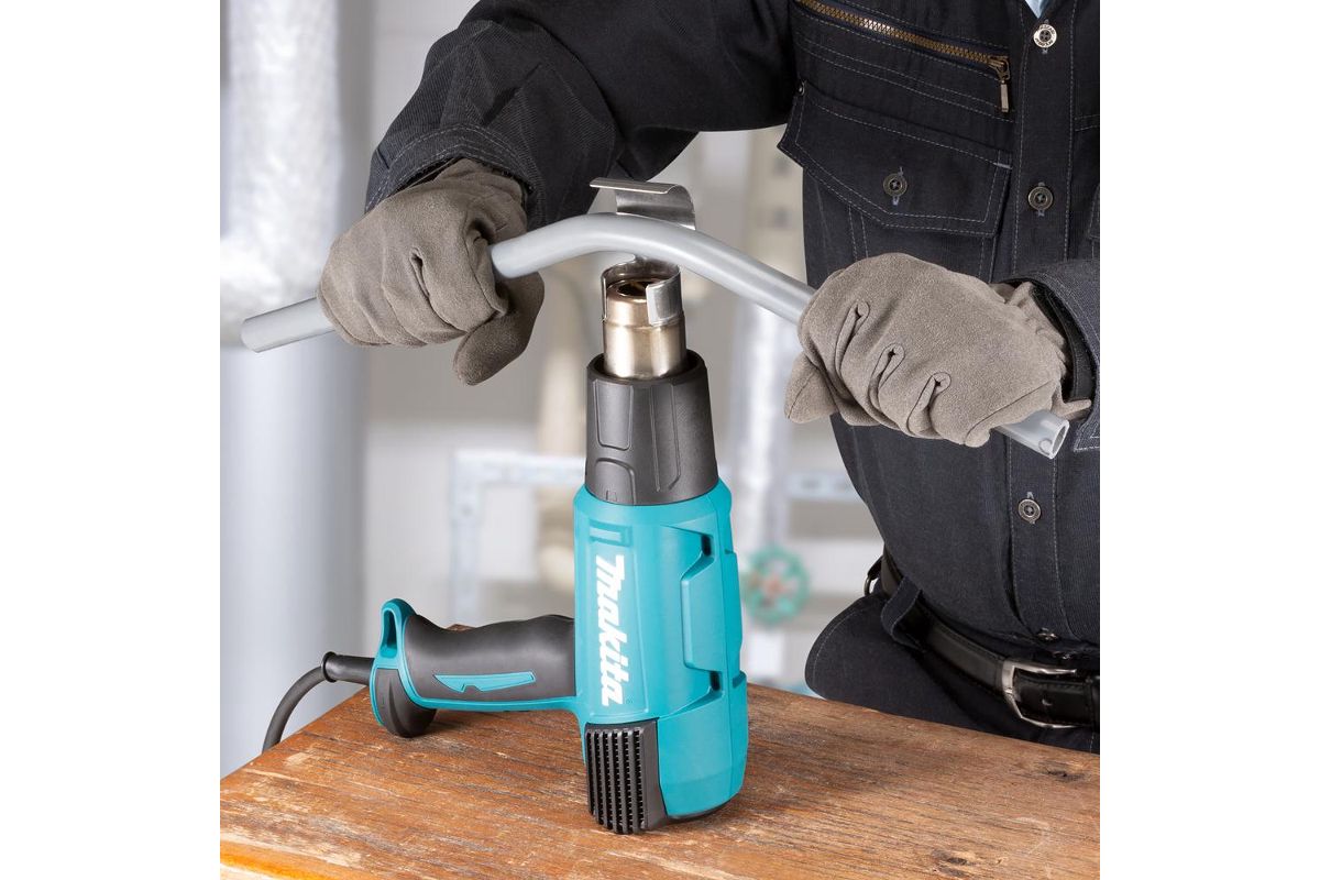 Строительный фен Фен строительный Makita HG6530VK 2000Вт 280-550 л\м 4 насадки Makita HG6530VK - фото, характеристики